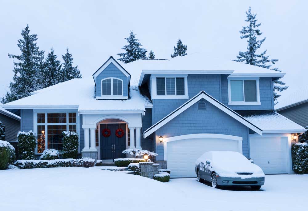 snowed-in home exterior